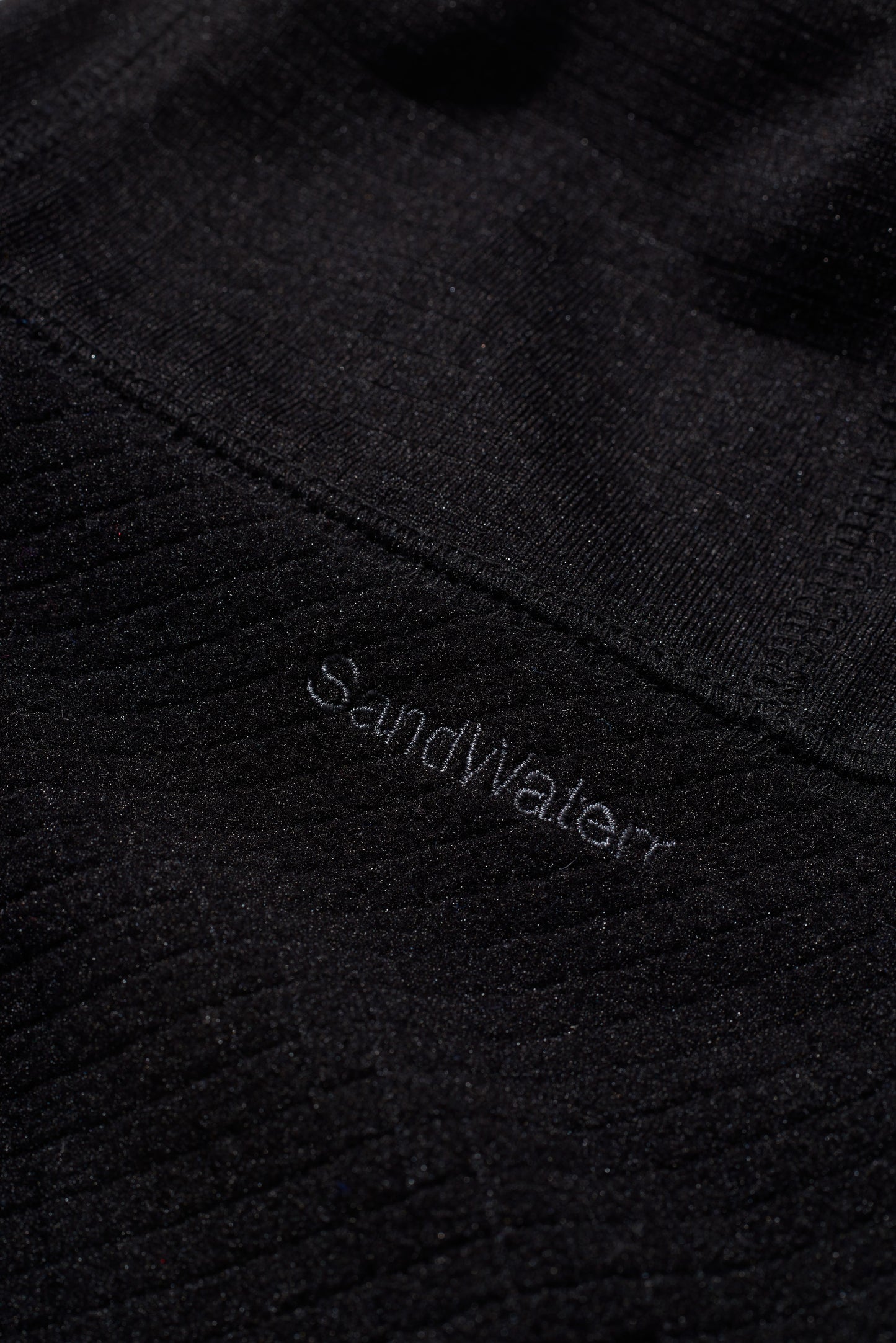 ORGANIZED EARMUFF CAP/ PE.BLOCK FLEECE