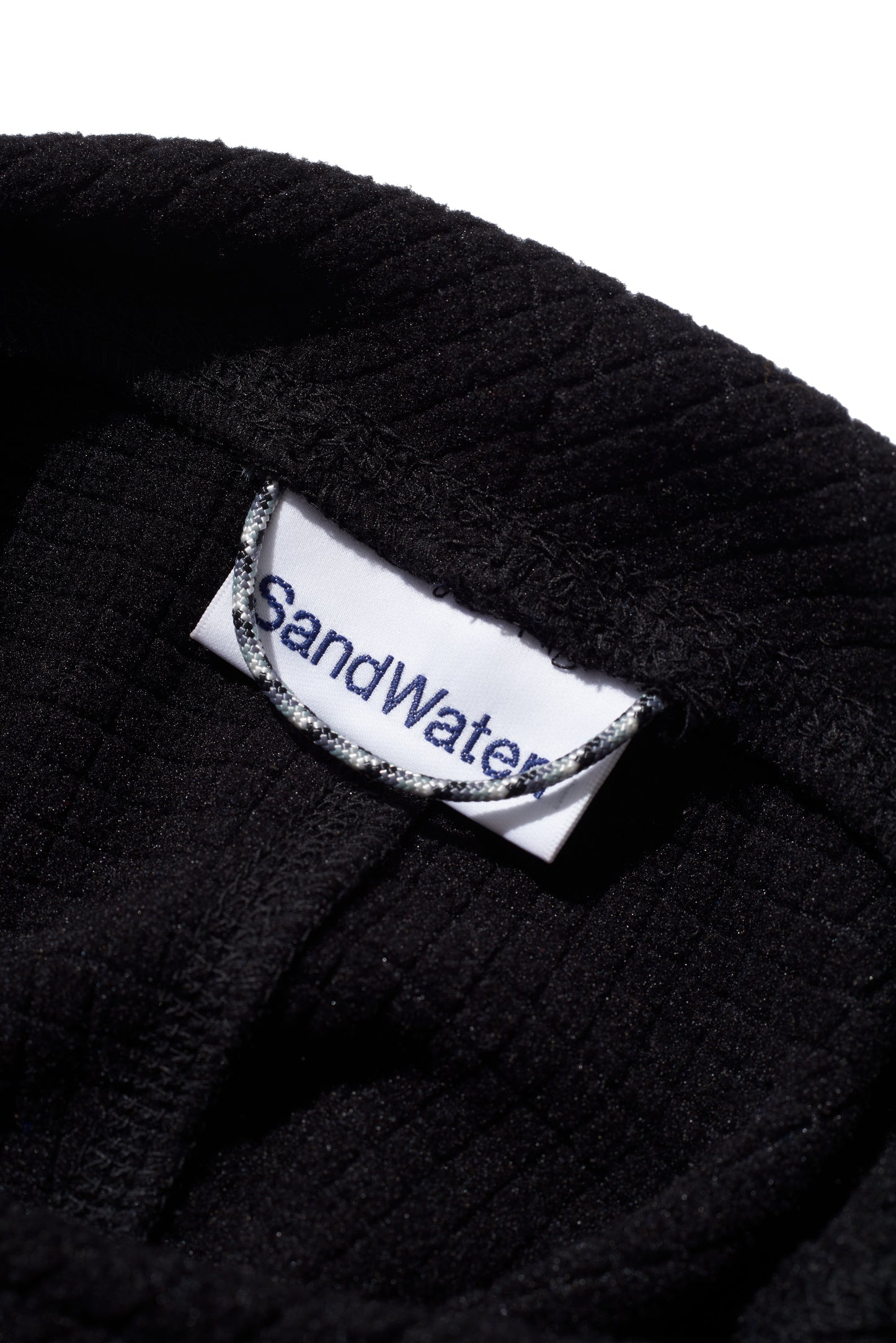 ORGANIZED EARMUFF CAP/ PE.BLOCK FLEECE