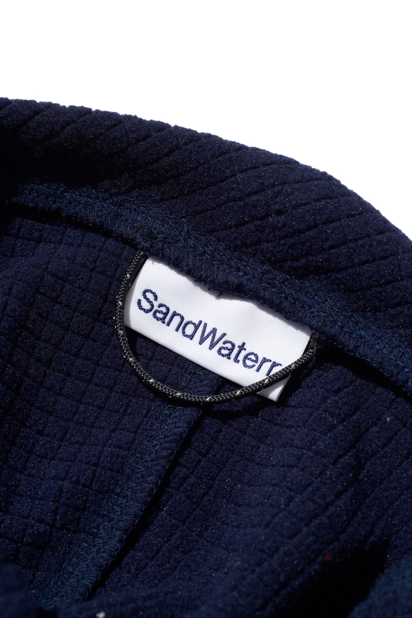 ORGANIZED EARMUFF CAP/ PE.BLOCK FLEECE